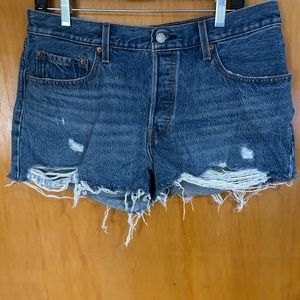 Levi’s 501 shorts destroyed in medium wash